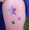 glitter stars arm tattoo pic